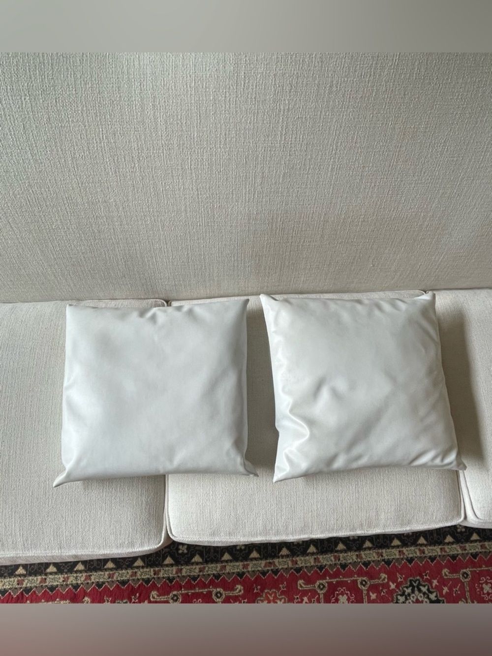 Two Faux Leather White Square Throw Pillows